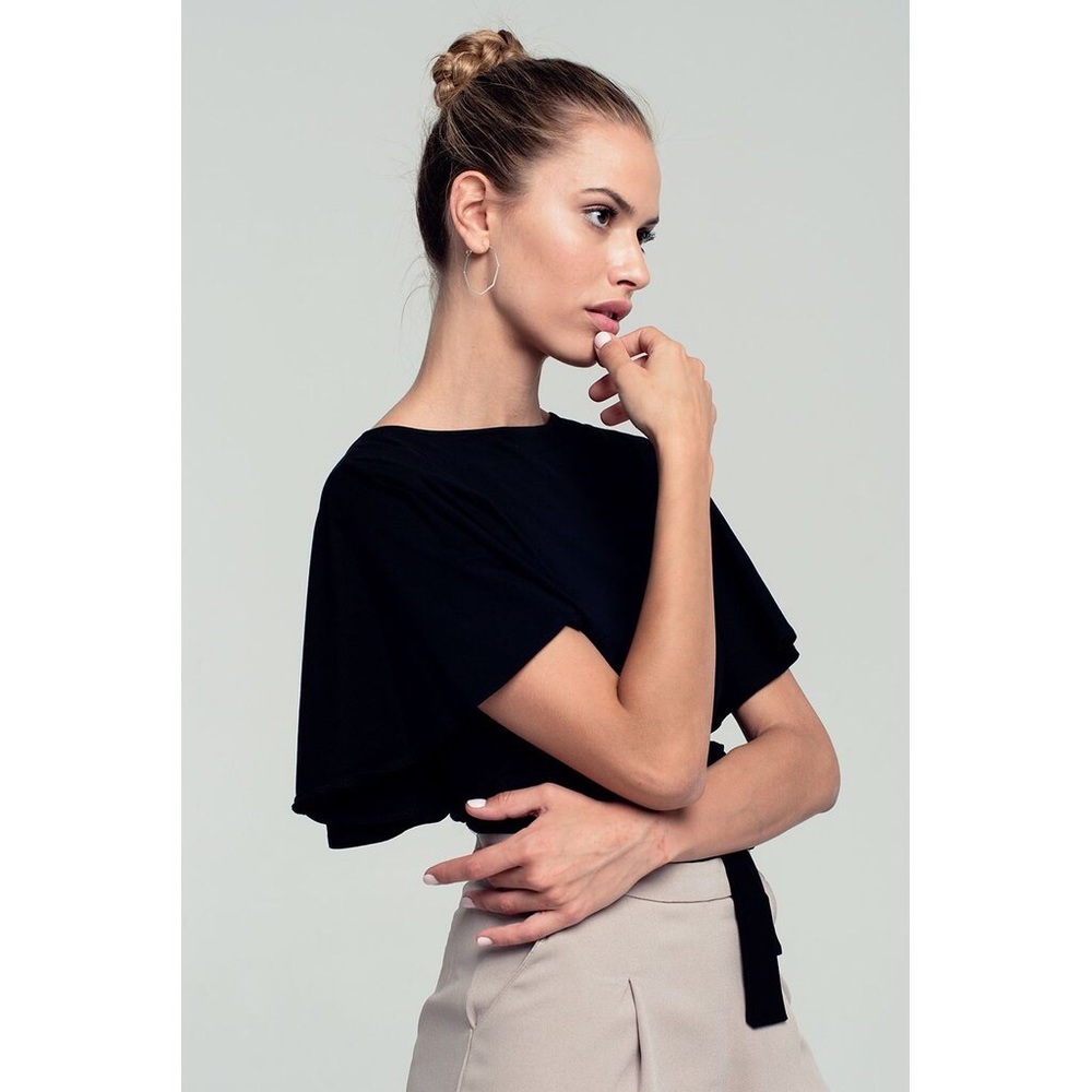 Ruffled sleeve black crop top with open back.